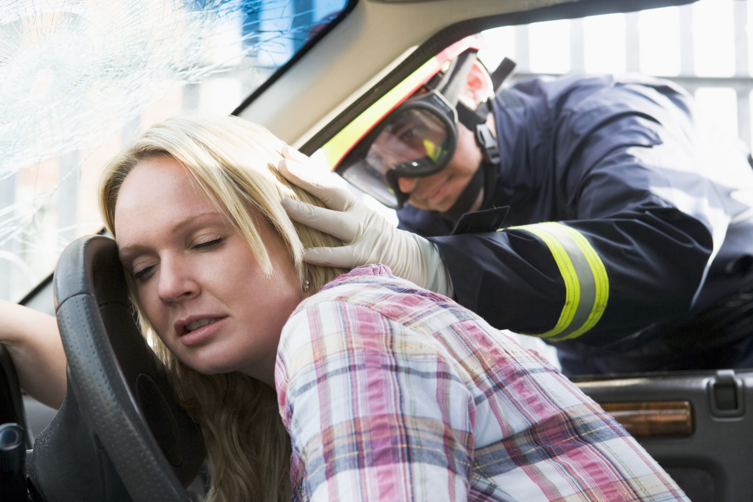 Prepare for the Worst: Must-Have Supplies for Every Emergency Kit 1 firefighters helping an injured woman in a car SKxgE6pRHj scaled