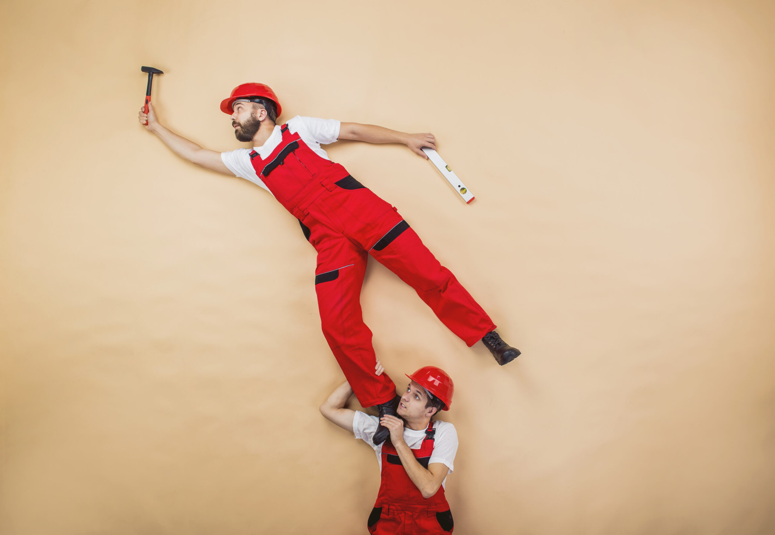 When Disaster Strikes: A Comprehensive Guide to Emergency Preparedness 2 graphicstock construction workers have an accident funny studio poses H0eXeoy2ZW scaled
