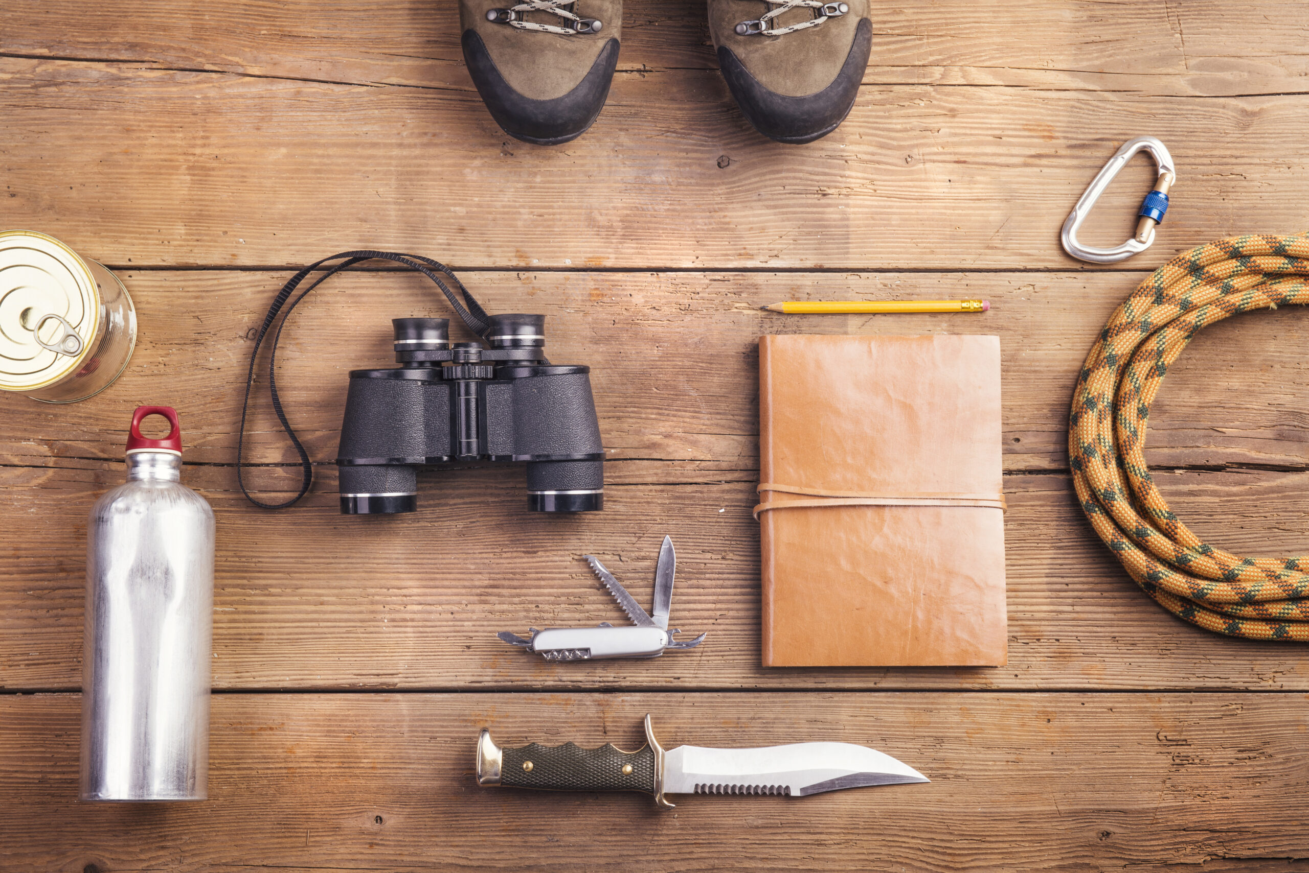 Stay Ready: Your Ultimate Guide to Disaster Preparedness 2 graphicstock equipment for hiking on a wooden floor background BAmOtO6WZ scaled