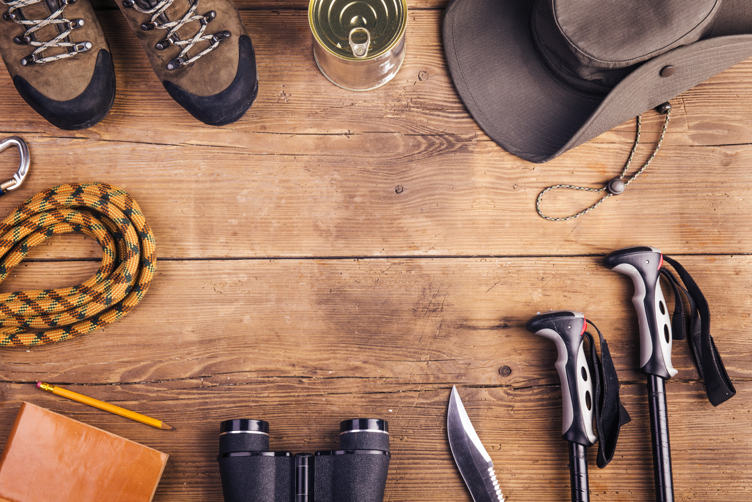 Stay Ready: Top Tips for Disaster Preparedness at Home and Beyond 2 graphicstock equipment for hiking on a wooden floor background HCeAlB aZb scaled