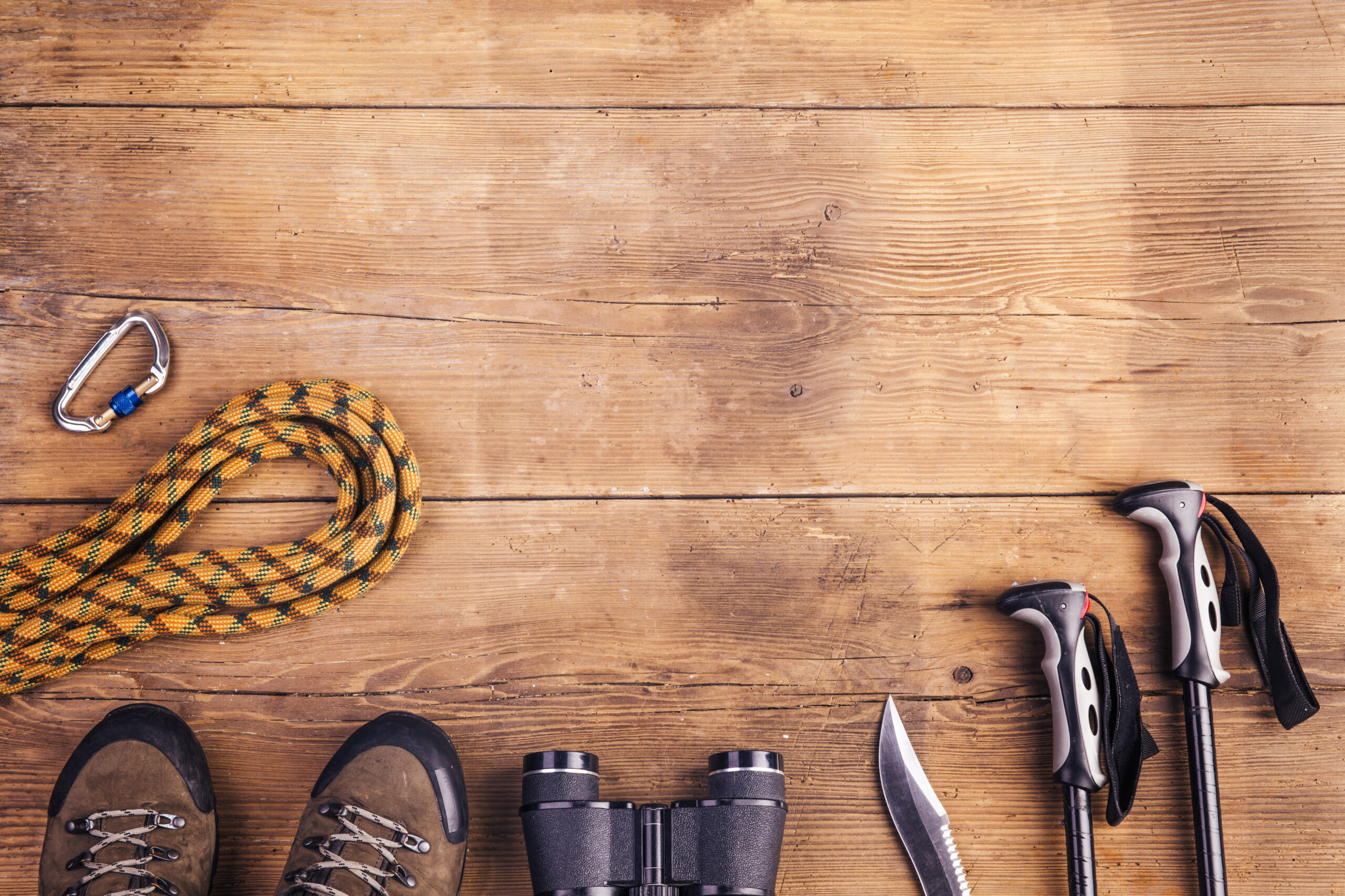 Planning for the Unexpected: Top Tips for Effective Emergency Preparedness 1 graphicstock equipment for hiking on a wooden floor background SCRxSdTWW scaled